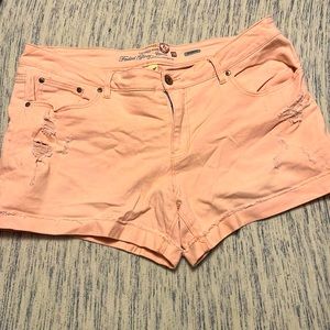 Distressed pink shorts